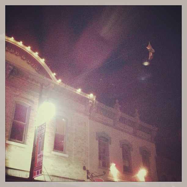 { #SXSW2013} Golden cowgirl boots glistening against the night sky♡