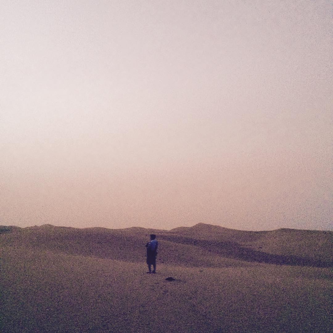 Sunrise in the sand dunes of Dubai.